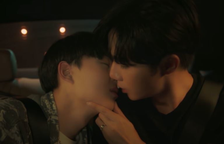 LianKuea kiss In the backseat of a car, Lian holding Kuea